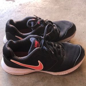 Nike women’s pink and black size 7.5 running shoe